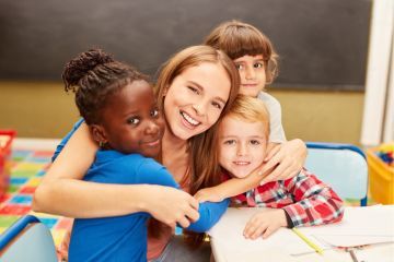Children learning and playing together in a classroom